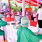 Presiden Joko Widodo Tinjau Langsung Vaksinasi Covid-19 Pelajar di Madiun